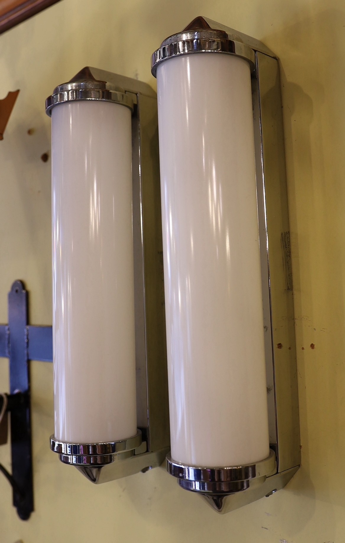 A pair of 1970s Dutch nickel plated and opaque white glass wall lights, height 37cm